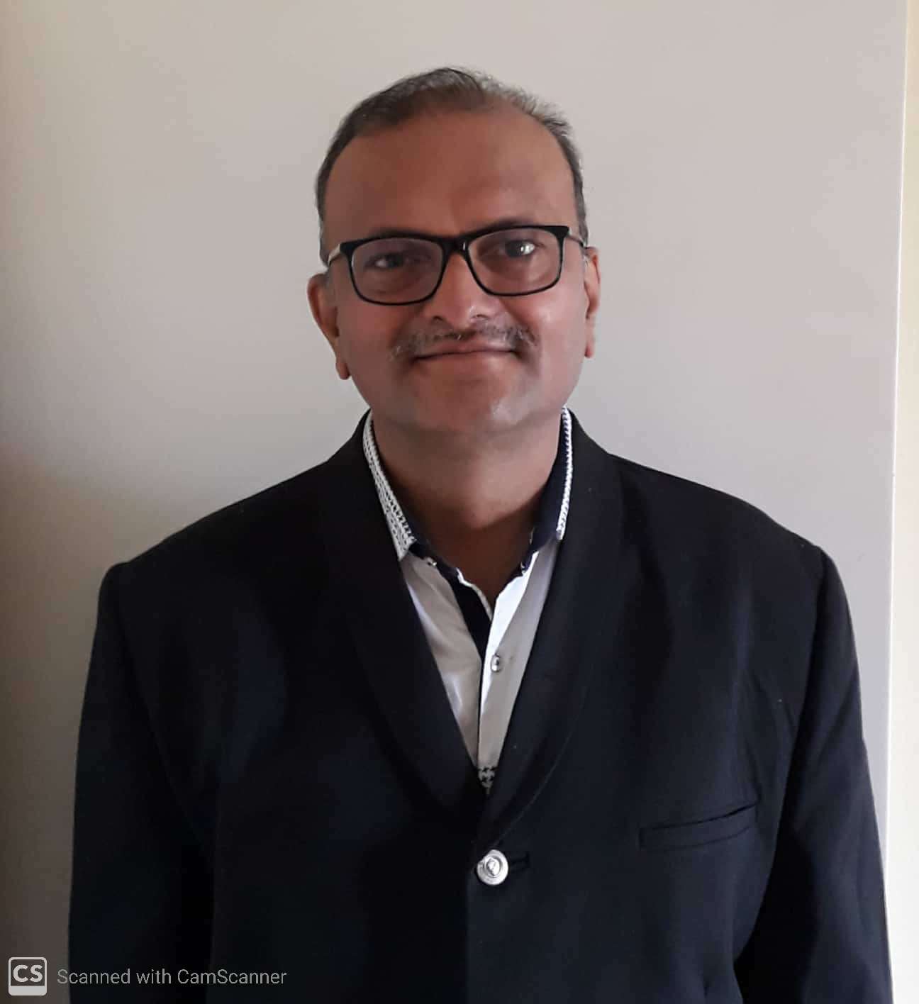 Portrait of CA Rushabh M. Vora, Chartered Accountant and founder of Rushabh Analytics